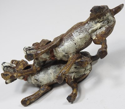 Lot 18 - A 19th century painted metal model of two...