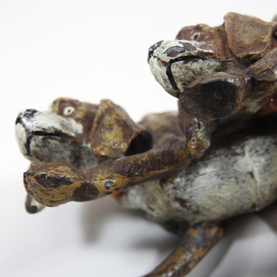 Lot 18 - A 19th century painted metal model of two...