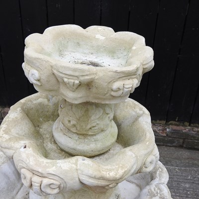 Lot 44 - A cast stone four tier garden fountain, of...