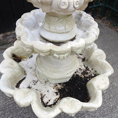 Lot 44 - A cast stone four tier garden fountain, of...
