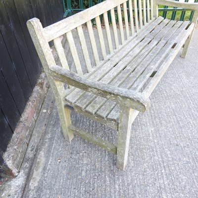 Lot 1 - A Tiger teak slatted wooden garden bench