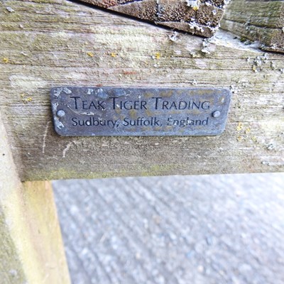 Lot 1 - A Tiger teak slatted wooden garden bench