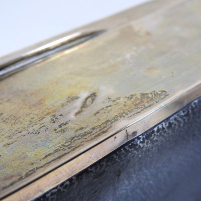 Lot 94 - An early 20th century silver table cigarette...