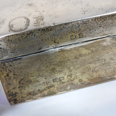 Lot 14 - A silver table cigarette box, together with a...