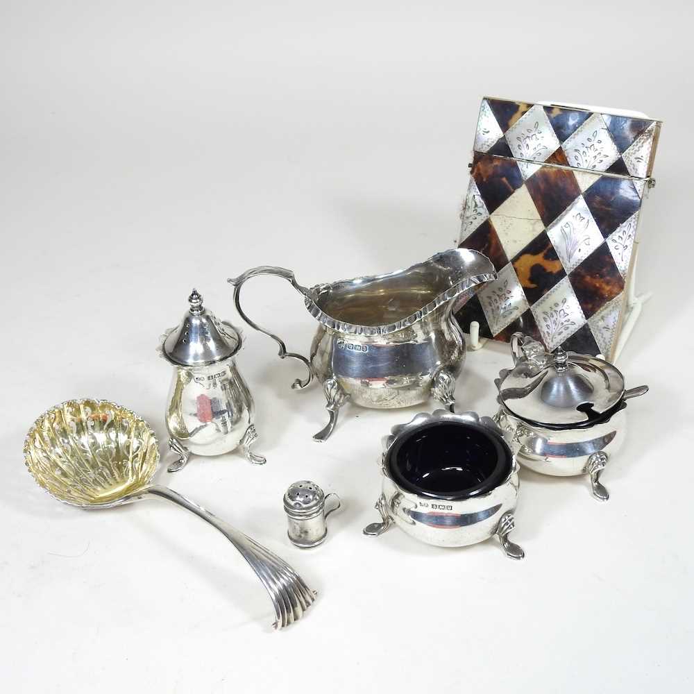Lot 28 - An early 20th century silver three piece...