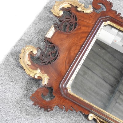 Lot 71 - A George III mahogany fret carved parcel gilt...