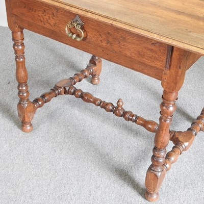 Lot 109 - An early 20th century French oak side table,...