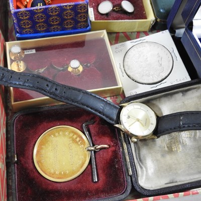 Lot 111 - A 15 carat gold locket, together with a...