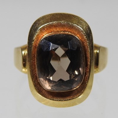 Lot 32 - An 18 carat gold quartz dress ring, stamped...