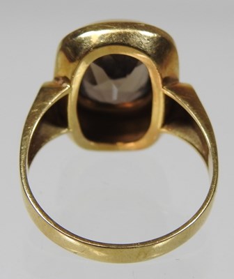 Lot 32 - An 18 carat gold quartz dress ring, stamped...