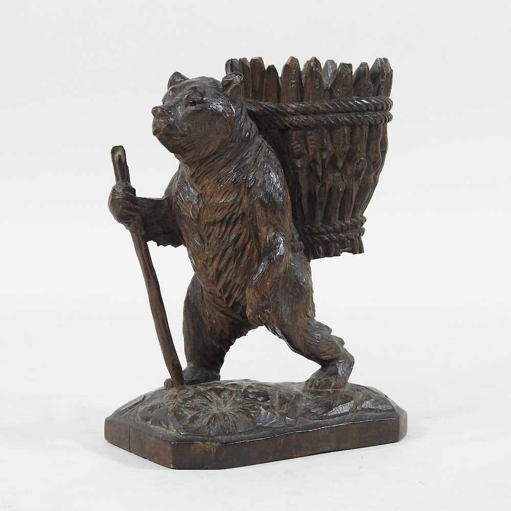 Lot 33 - A 19th century Black Forest carved wooden...