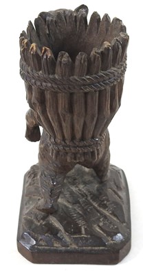 Lot 33 - A 19th century Black Forest carved wooden...