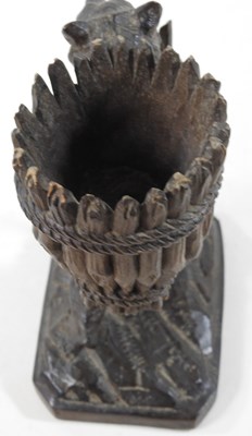 Lot 33 - A 19th century Black Forest carved wooden...