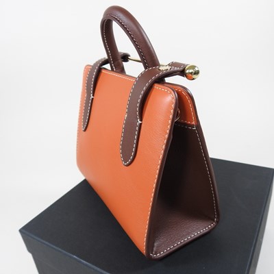 Lot 25 - A Strathberry nano tote bag in maple and...