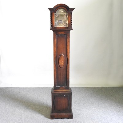 Lot 89 - A 1920's oak cased granddaughter clock , 171cm...