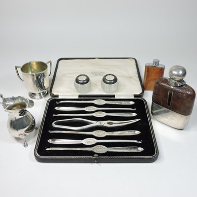 Lot 73 - An early 20th century silver and leather hip flask