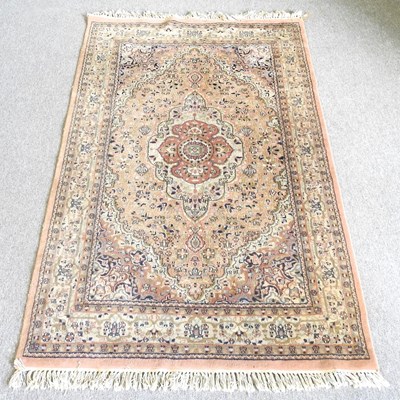 Lot 74 - A Persian rug, of foliate design, with a...