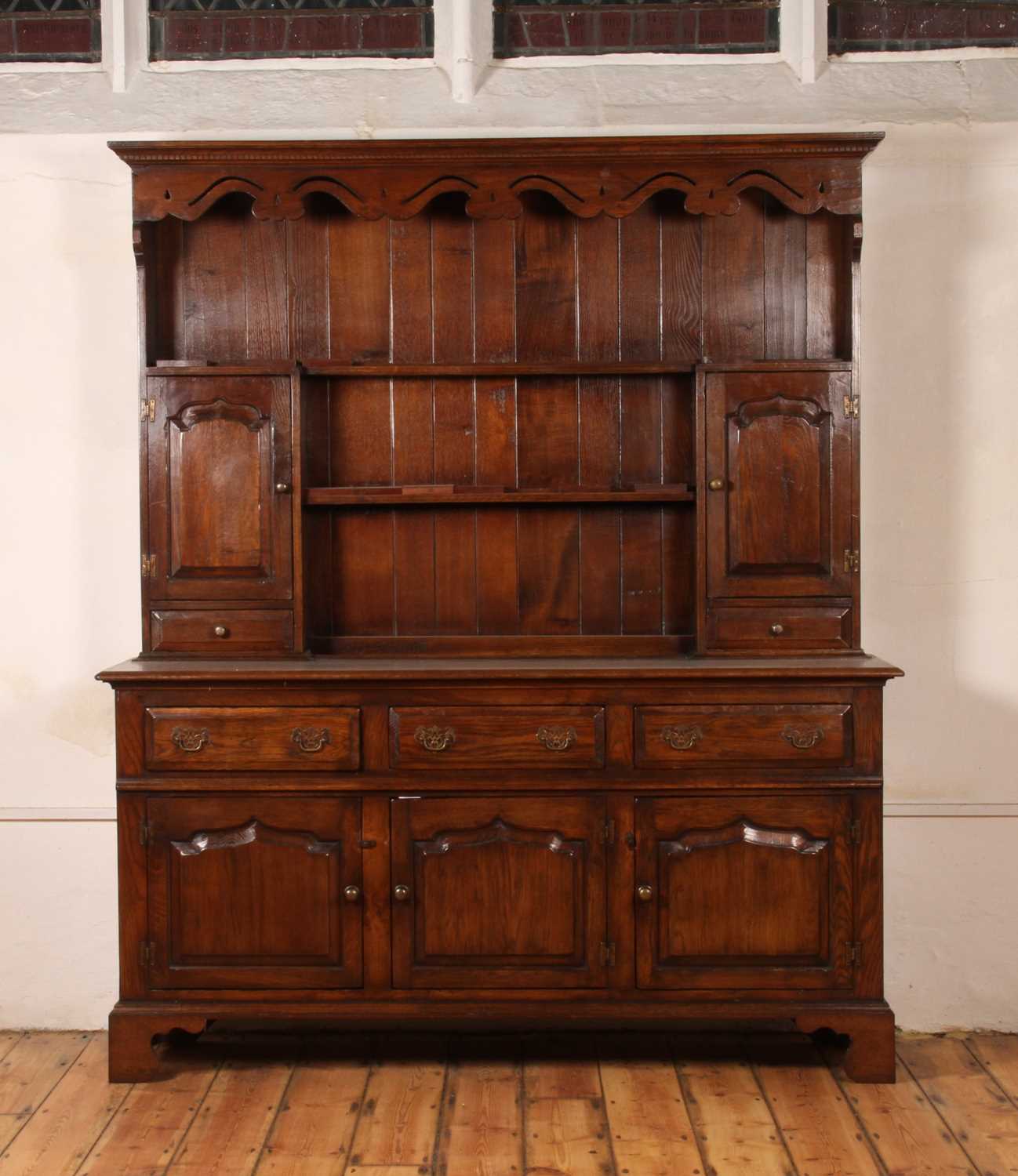 Lot 49 - An oak dresser, 18th century style, 20th...