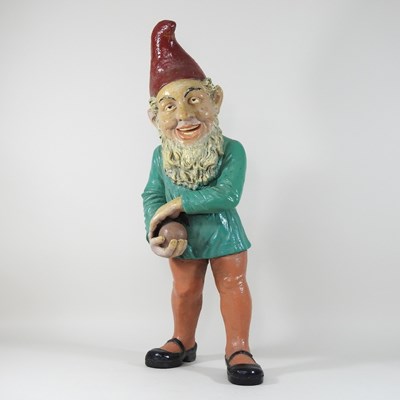 Lot 117 - An early 20th century continental painted plaster garden gnome