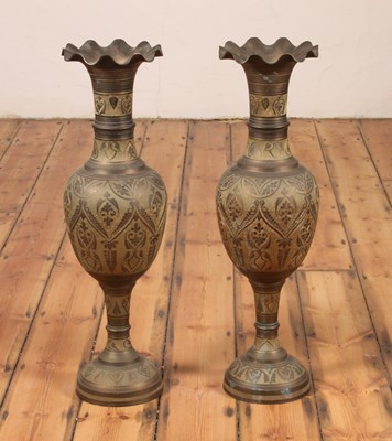 Lot 352 - A pair of large Indian brass vases, each...