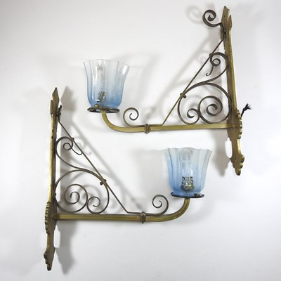 Lot 126 - A pair of Arts and Crafts brass wall lights