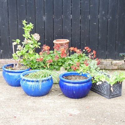 Lot 87 - A collection of three blue glazed garden pots,...