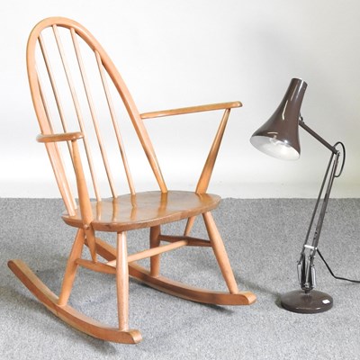 Lot 150 - An Ercol light elm rocking chair, together...