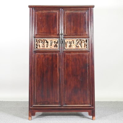 Lot 229 - A Chinese wedding cabinet, with gilt panels,...