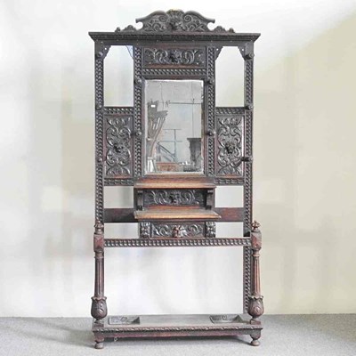 Lot 134 - A 19th century heavily carved dark oak...
