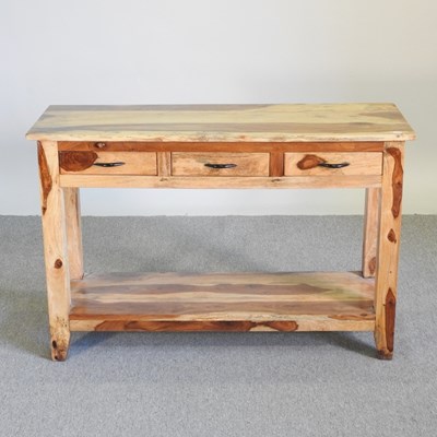Lot 143 - A modern hardwood side table, containing three...