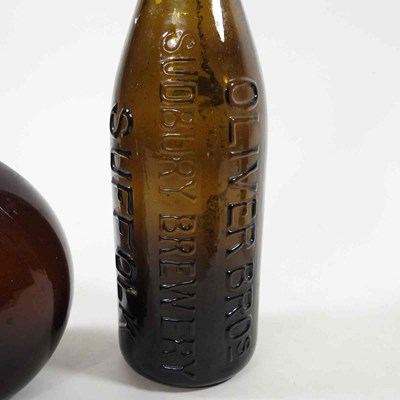 Lot 45 - A 19th century brown glass wine bottle,...