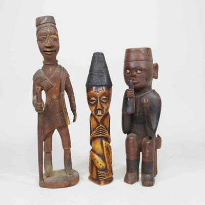 Lot 56 - An African carved bone tribal statue, of a...