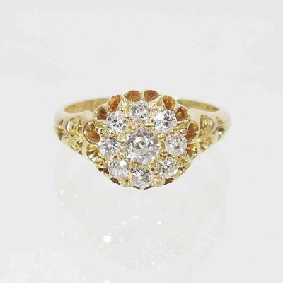Lot 361 - An 18 carat gold diamond cluster ring, the...