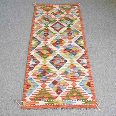 Lot 120 - A chobi kilim runner, with coloured diamonds,...