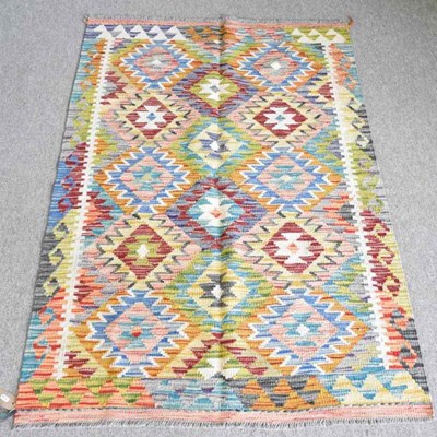 Lot 131 - A chobi kilim, with all over coloured diamonds,...