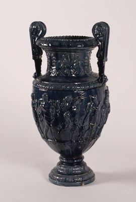 Lot 19 - A large blue glazed majolica urn, 19th century,...