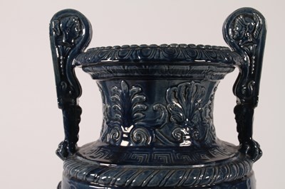 Lot 19 - A large blue glazed majolica urn, 19th century,...