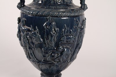 Lot 19 - A large blue glazed majolica urn, 19th century,...