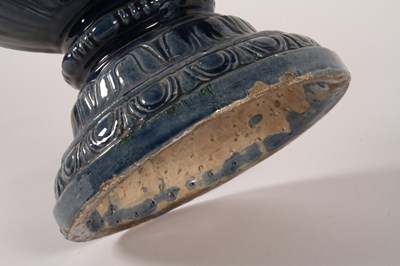 Lot 19 - A large blue glazed majolica urn, 19th century,...