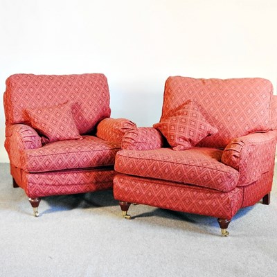 Lot 124 - A pair of Multiyork red upholstered armchairs,...