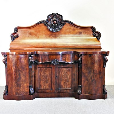 Lot 145 - A large Victorian carved mahogany serpentine...