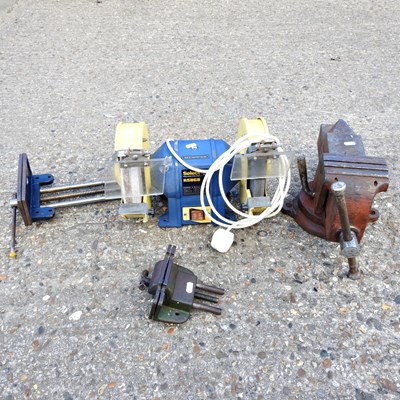 Lot 65 - A vice, together with two others smaller and a...