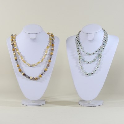 Lot 63 - A carved stone bead necklace, together with two other bead necklaces
