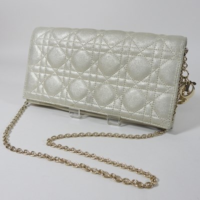 Lot 108 - A Dior pale gold coloured clutch bag