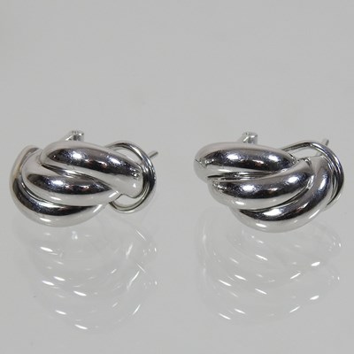 Lot 43 - A pair of 18 carat gold earrings