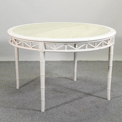 Lot 91 - A cream painted marble top dining table