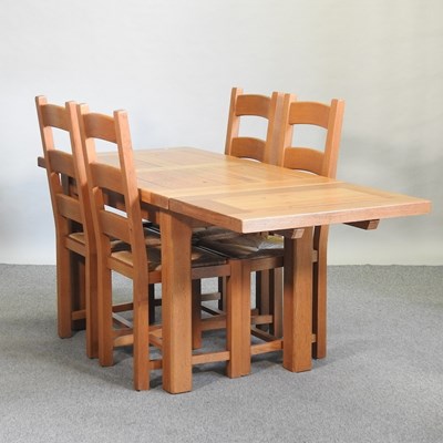 Lot 484 - A modern light oak dining table