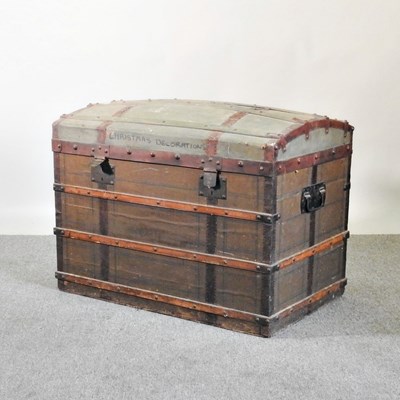 Lot 54 - A 19th century dome top wooden bound trunk