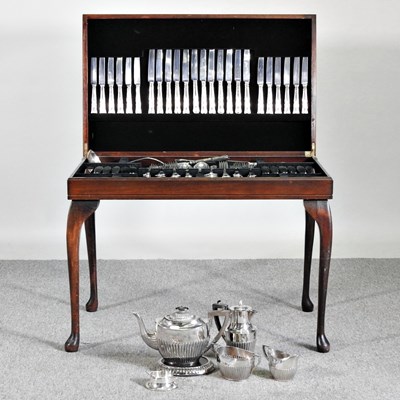 Lot 57 - A table canteen of silver plated cutlery, with...