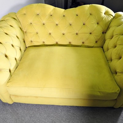 Lot 20 - A contemporary lime green velvet upholstered...